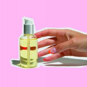 Person getting a bottle of hair serum