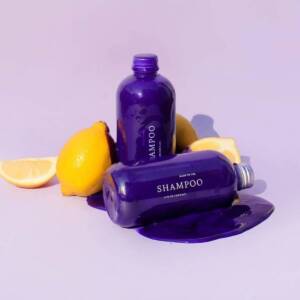 Best purple shampoo for blonde hair: 2 bottles of purple shampoo and some lemons